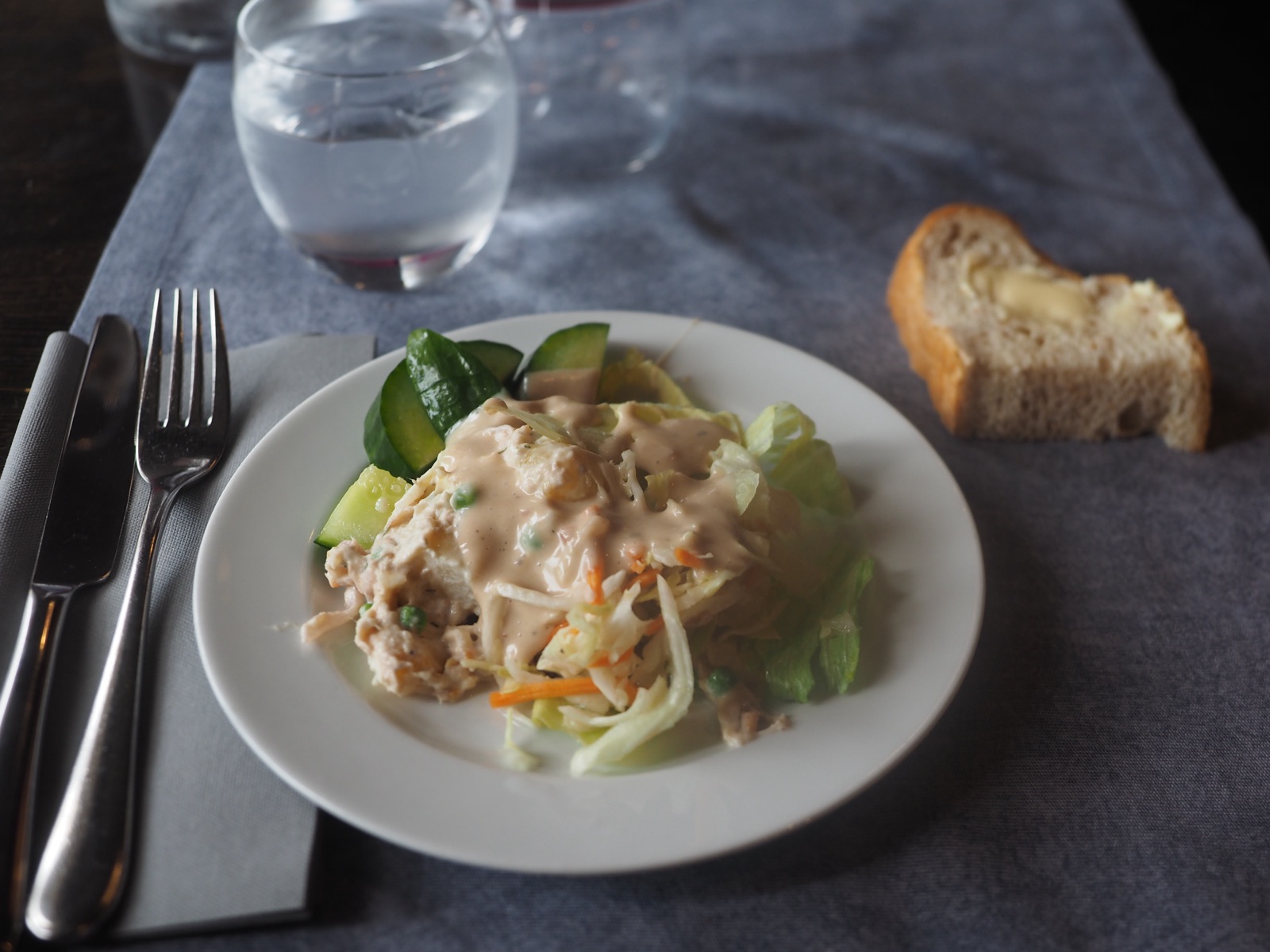 Fresh mixed salad served in a white bowl